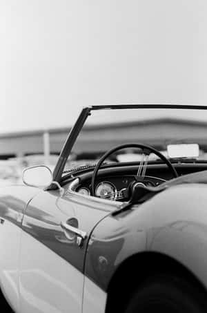 Classic Elegance: Black And White Vintage Car Wallpaper