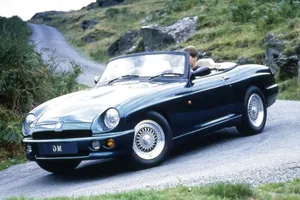 Classic Elegance: The Head-turning Mg Rv8 Sports Car Wallpaper