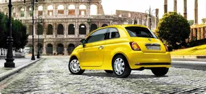 Classic Fiat 500 In A Picturesque Setting Wallpaper