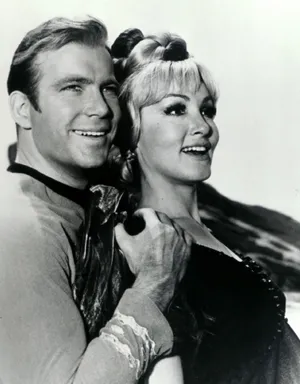 Classic Film Noir Scene With A Mysterious Man Wallpaper