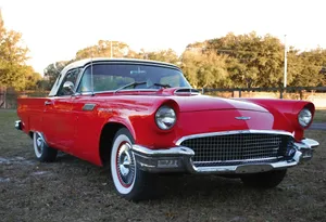 Classic Ford Thunderbird Cruising The Streets Wallpaper