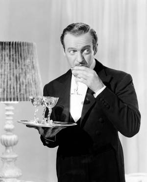 Classic Hollywood Star, David Niven, Enjoying Drinks Wallpaper