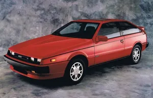 Classic Isuzu Impulse In Breath-taking Sunset Backdrop. Wallpaper