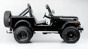 Classic Jeep Cj On A Scenic Off-road Adventure Wallpaper