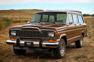 Classic Jeep Wagoneer On An Off-road Adventure Wallpaper