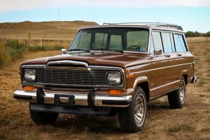 Classic Jeep Wagoneer On An Off-road Adventure Wallpaper