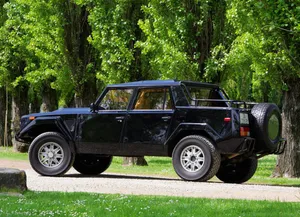 Classic Lamborghini Lm002 Off-roading Performance Wallpaper