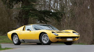 Classic Lamborghini Miura In Vibrant Orange Wallpaper