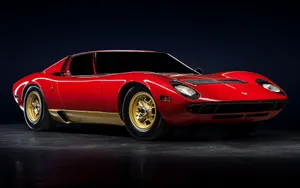 Classic Lamborghini Miura On Scenic Road Wallpaper