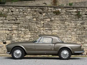 Classic Lancia Aurelia B20 G T Coupe Stone Wall Background Wallpaper