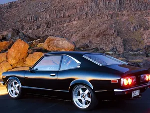 Classic Mazda Rx-3 In Action Wallpaper