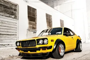 Classic Mazda Rx-3 In Pristine Condition Wallpaper