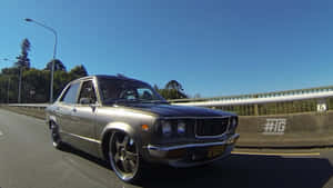 Classic Mazda Rx-3 In Vibrant Red Wallpaper