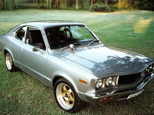 Classic Mazda Rx-3 On The Road Wallpaper