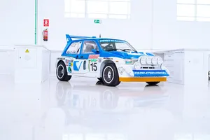 Classic Mg Metro 6r4 Rally Car In Action Wallpaper