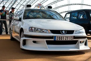 Classic Peugeot 406 In Brilliant Blue Wallpaper