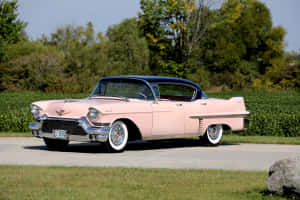 Classic Pink Cadillac In Its Glory Wallpaper