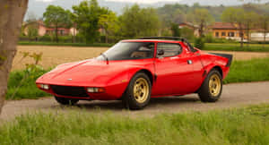 Classic Red Lancia Stratos Side View Wallpaper