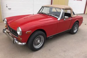 Classic Red Mg Midget On Road Wallpaper