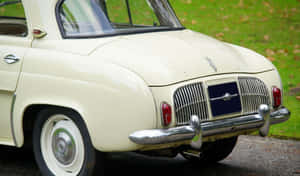 Classic Renault Dauphine On The Street Wallpaper
