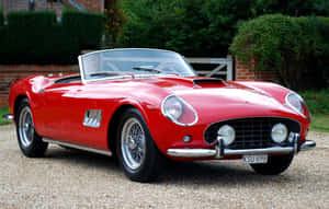 Classic Vintage Car On A Tranquil Road Wallpaper