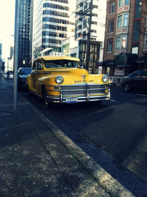 Classic Yellow Cab In The City Wallpaper