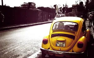 Classic Yellow Volkswagen Beetle Wallpaper