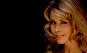 Claudia Schiffer Striking A Pose During A Photoshoot. Wallpaper
