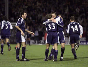 Claudio Caniggia With Rangers Fc Teammates Wallpaper