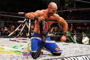 Claudio Castagnoli, Triumphantly Holding The Foh Championship Belt Wallpaper