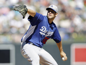 Clayton Kershaw Pitching In Blue Wallpaper