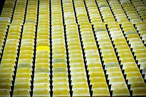 Clean And Conspicuous Yellow Chair Wallpaper