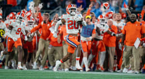 Clemson Player Celebration During Game.jpg Wallpaper