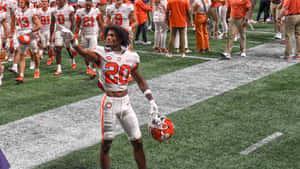 Clemson Player Celebrationon Field Wallpaper