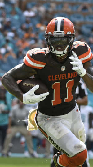 Cleveland Browns Player Running With Football Wallpaper