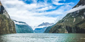 Cliffs Clouds Milford Sound Wallpaper