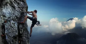 Climbing Shirtless Man Wallpaper