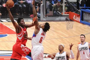 Clint Capela Intense Game With Clippers Wallpaper