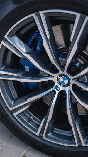 Close-up Bmw M Tire And Emblem Wallpaper