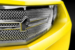 Close-up Of A Sleek Car Grill Design Wallpaper