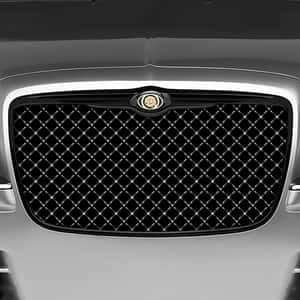 Close-up Of A Sleek Car Grill Wallpaper