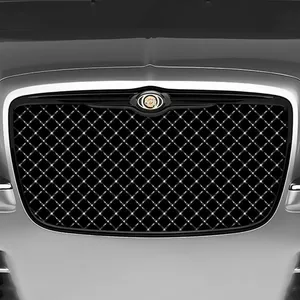 Close-up Of A Sleek Car Grill Wallpaper