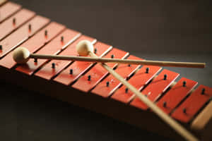 Close Up Xylophone With Mallets Wallpaper