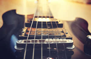 Closeup Bass Guitar Strings Wallpaper