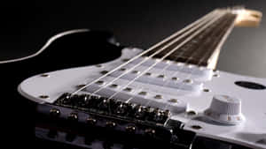 Closeup Black Electric Bass Guitar Wallpaper