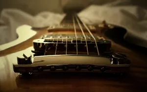 Closeup Electric Guitar Bridge Wallpaper