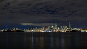 Cloudy Night Sky Seattle Skyline Wallpaper