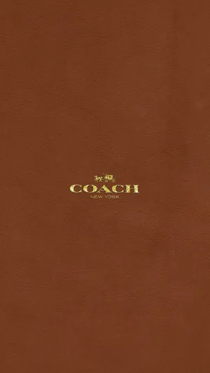 Coach Logo On A Brown Background Wallpaper
