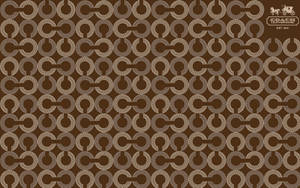 Coach Logo Pattern In Brown Wallpaper