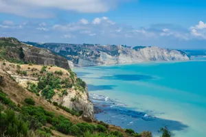 Coastal_ Cliffs_and_ Turquoise_ Waters.jpg Wallpaper